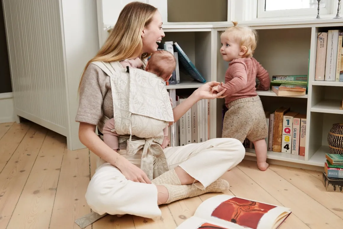 Stokke® Limas™ Draagzak Turquoise Grey Melange